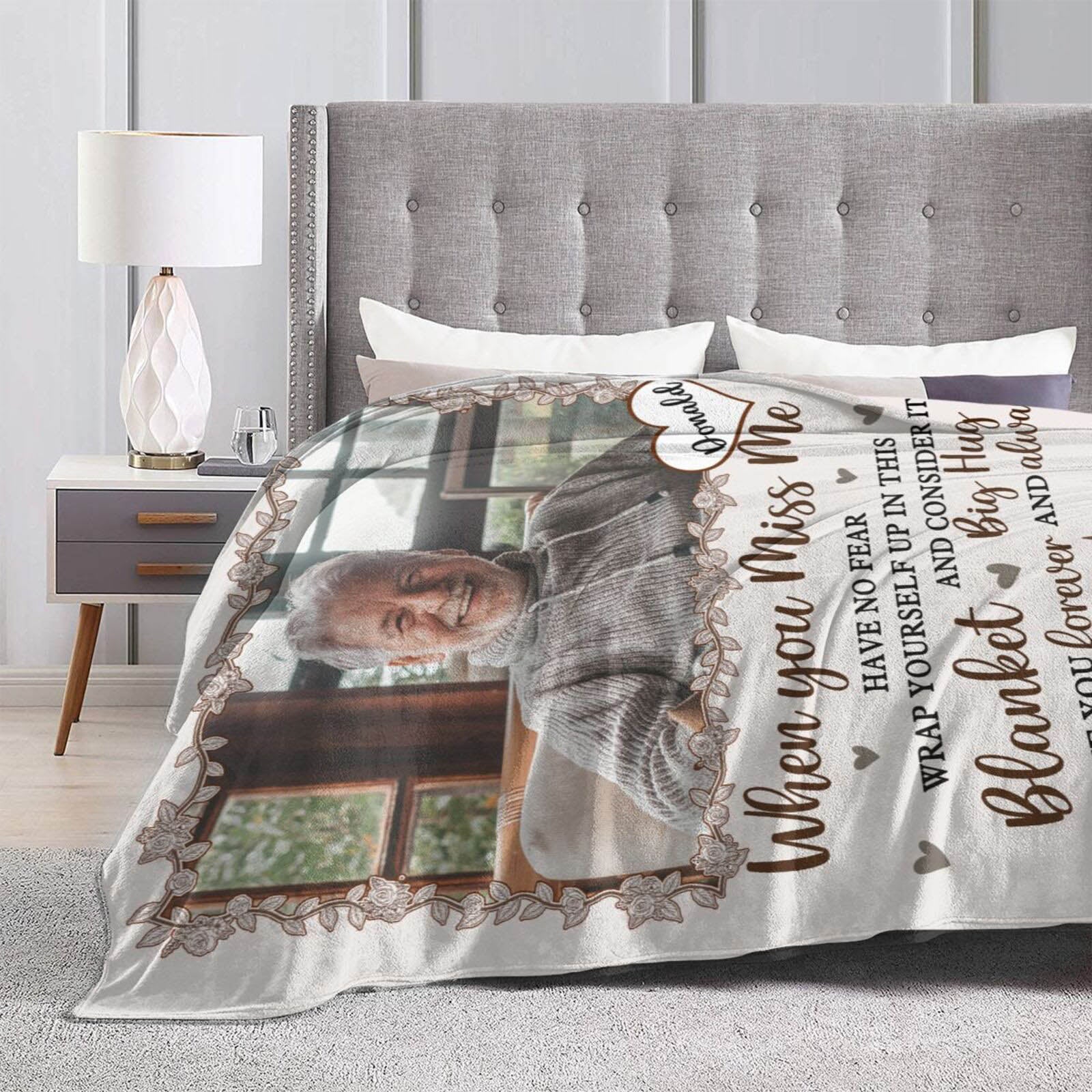 Personalized memorial photo blanket on bed, gentle sympathy decor for home bedroom