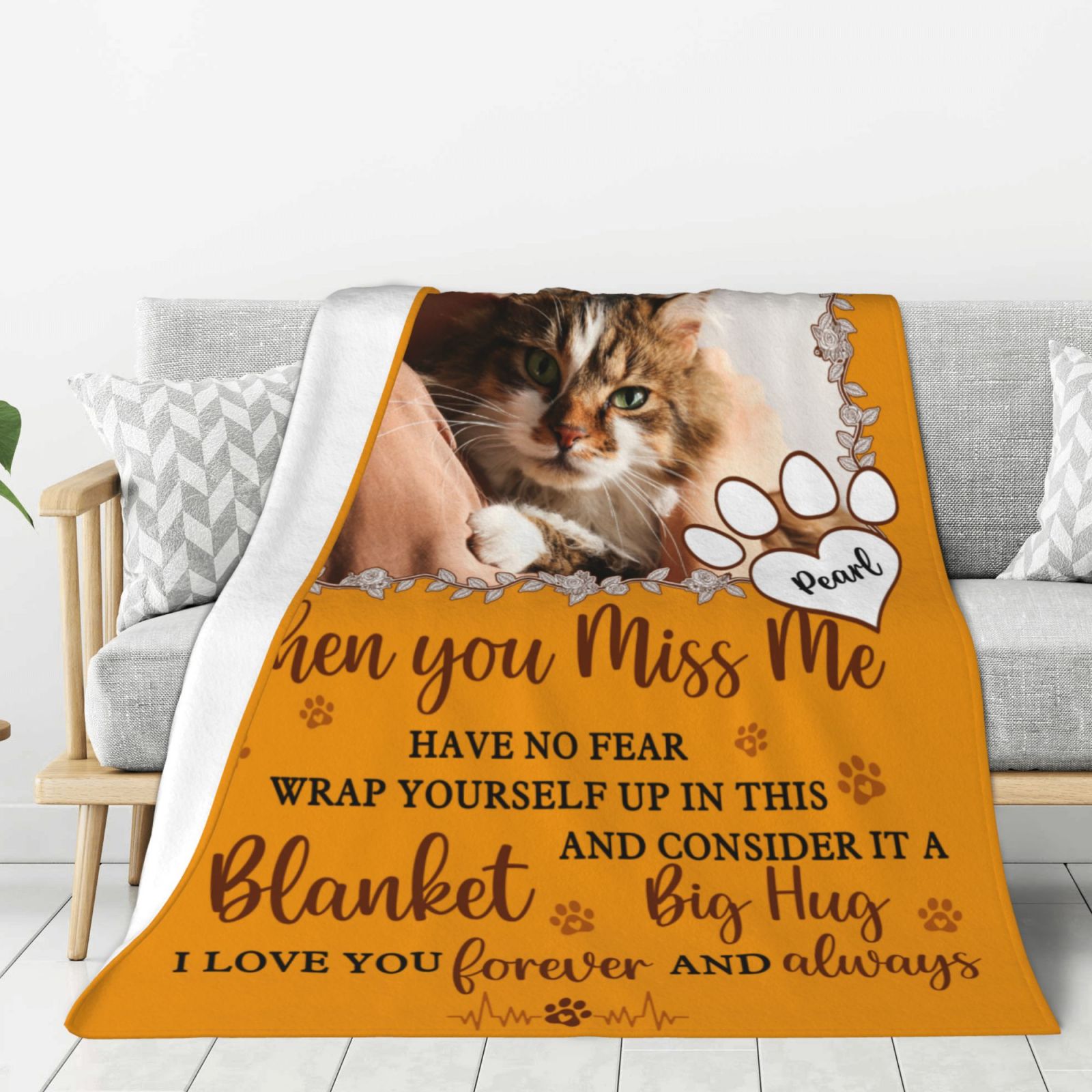 Soft memorial blanket on sofa, thoughtful sympathy gift for pet loss and remembrance